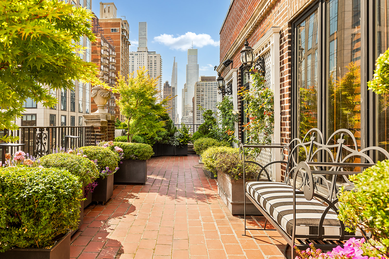 This $5M Sutton Place penthouse is wrapped in a garden terrace overlooking the city